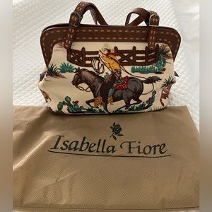 This is an original embellished Isabella Fiore handbag